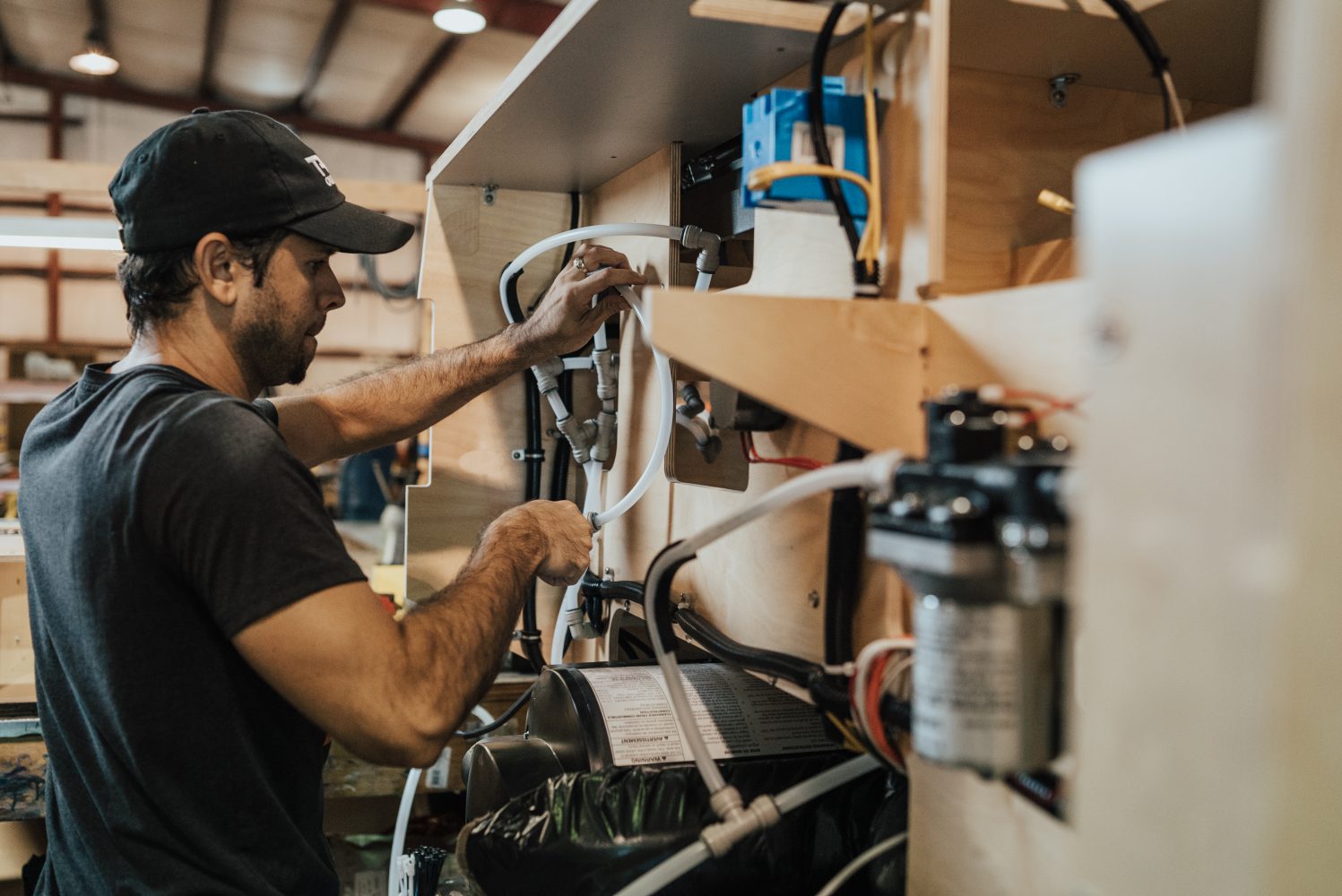 man working on TAXA trailer systems